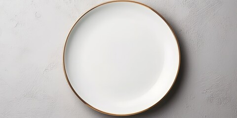 Minimalistic White Plate with Golden Rim on Concrete Surface
