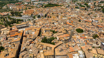 Aerial view of the Civic Tower in Piazza Plebiscito in Viterbo, Lazio, Italy. It is one of the symbols of the historic center of the city.