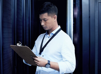 Data center, man and technician with clipboard in server room for solution, maintenance or software update. Cyber, checklist and person with document for inspection, configuration or system report