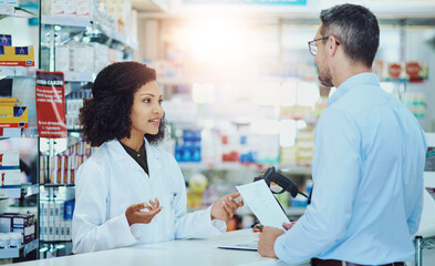 Woman, pharmacist and talking with customer for medication, prescription or visit at pharmacy. Female person or medical advisor consulting with patient at counter for pharmaceuticals at dispensary