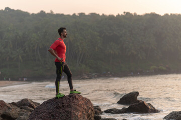 Person exercising at the beach