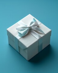 Obraz premium A white gift box with a light blue satin ribbon tied into a beautiful bow sits on a blue background, offering a minimalist and elegant visual.