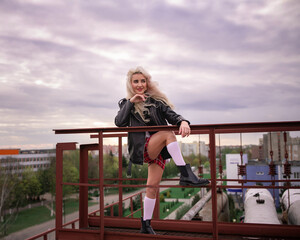 Portrait of a young beautiful blonde girl outdoors.