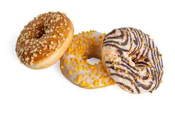 freshly baked assorted donuts isolated on white
