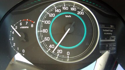 Budget stick shift vehicle instrument cluster under hard acceleration