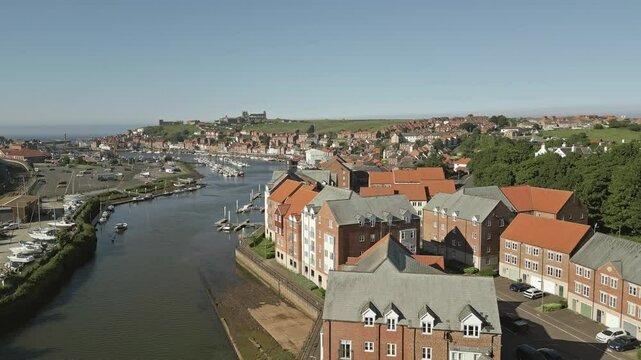 Whitby harbour buildings and River Esk, North Yorkshire, England