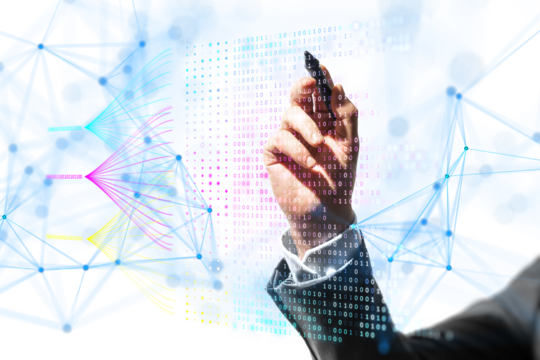 A person interacting with futuristic digital graphics, against a white background, illustrating technology and data concept