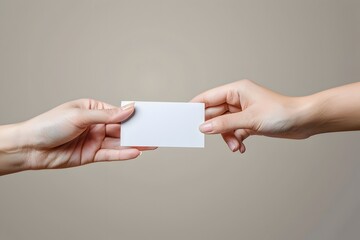 Hands of a Woman Showcasing a Blank White Paper business card