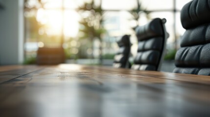 Spacious conference room with a large wooden table and high-back black leather chairs. Bright morning light filters through expansive windows, creating a professional ambiance.