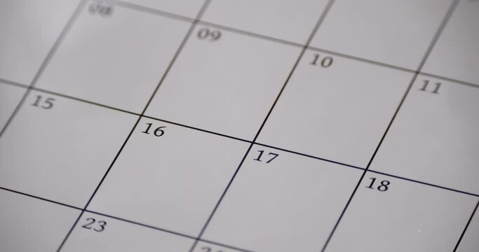 Close-up of days on a calendar.