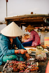 Merchants of the Cai Rang floating market in Can Tho, Vietnam