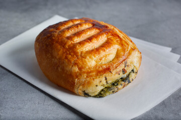 A view of a spinach croissant.