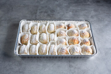 A view of a tray of assorted maamoul cookies.