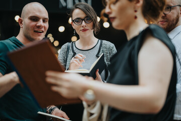 Creative business team brainstorming ideas, discussing project progress, and marketing strategies. Collaborative meeting and problem-solving in a modern office environment.