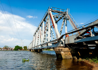 Landscape of Binh Loi bridge in Ho Chi Minh City., Vietnam. This is the first railway bridge across...
