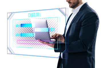 A businessman using a laptop with a graphic overlay of a chat AI interface, set against an isolated white background, representing technology