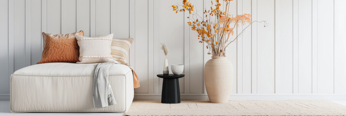 Minimalist living room interiors in soft and warm colors with minimal furniture and copy space. Stylish realty composition for advertising.
