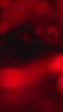Crystal prism refracting red light in vivid colors. Beautiful diamond. Magic abstract background