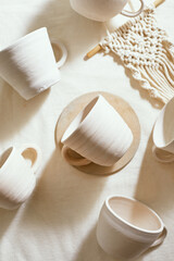 Ceramic cup on a textile