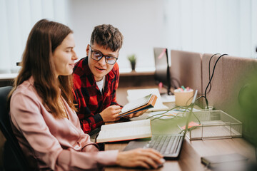 Young professionals discussing a project in a modern office setting