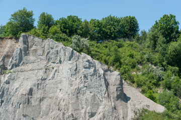 detail view of Scarborough Bluffs, or The Bluffs, a geological feature (escarpment) on Toronto's waterfront, on a clear blue sky day