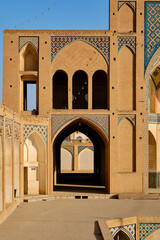 Kashan, Iran, 01.07.2023: Agha Bozorg Mosque, Architectural details of iranian madrasah