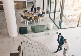 High angle, office and business people on steps for corporate work, accounting agency and lobby...