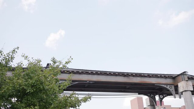 City train going by on bridge above 4k