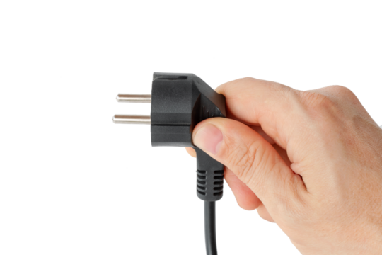 electric cable with a plug in a man's hand, close-up, isolated.