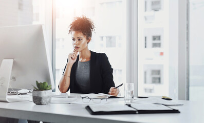 Serious, notes and woman in office, computer and reading of research, online and journalist on desk. Company, digital and reporter with notebook for editing of story for blog, news and writing