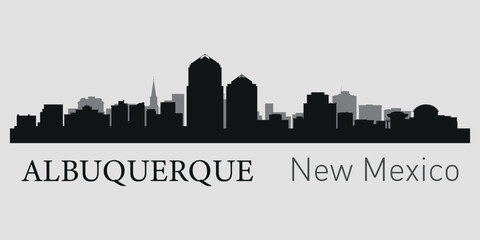 Naklejka premium The city skyline. Albuquerque, New Mexico. Silhouettes of buildings. Vector on a gray background