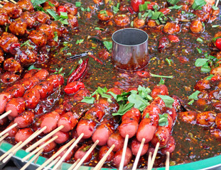 meatballs grilled and soaked in spicy dipping sauce