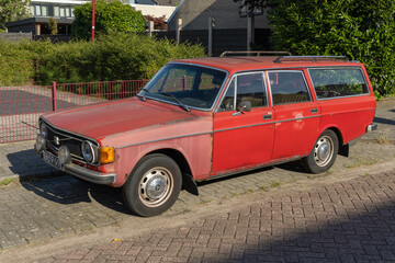 Vintage red Volvo 145 station wagon