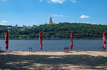 View of the city of Kyiv and the Kyiv-Caves (Pechersk) Lavra from the beach on the left bank of the Dnieper