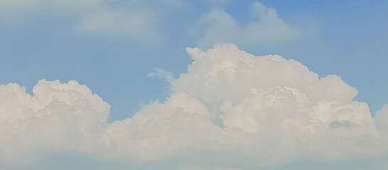 Fototapeta premium The sky is bright and beautiful blue and the clouds are white