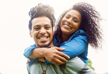 Couple, piggyback and smile for portrait, outdoor and happy in relationship, commitment and trust in date. Relax, fun and break for romance in weekend, people or joy in park, care and love in nature
