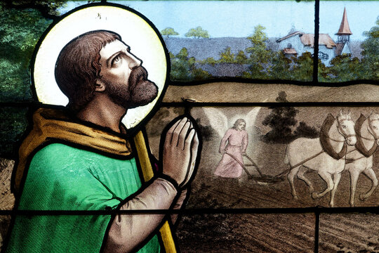 The ploughman's Saint Isidore, whose plough is pulled by an angel. Saint Isidore, le saint patron des laboureurs dont la charrue est tir&eacute;e par un ange.