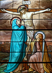 Jesus Christ crucified on the cross represented with Marie and Saint John. Jésus crucifié sur la...