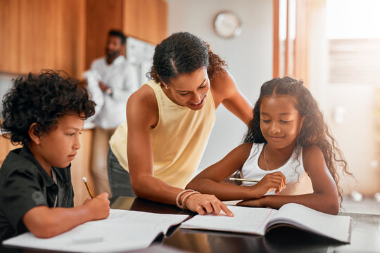 Mother, children and books with homework for learning, guidance or help on kitchen table. Happy mom, kids or siblings studying together for education, knowledge or childhood development at house