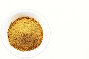 all purpose garlic,onion,ginger spice mix ground powder for vegetarian or non vegetarian cooking,white background,top view,copy space