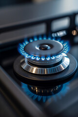 Close-up of single gas burner. Fire. Natural gas. Blurry background. Photo with copy space