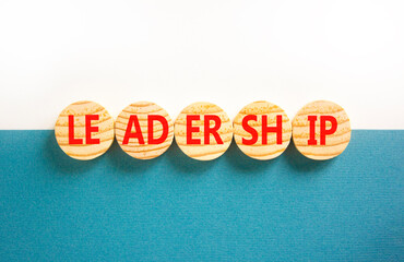 Leadership symbol. Concept word Leadership on beautiful wooden circles. Beautiful white and blue...