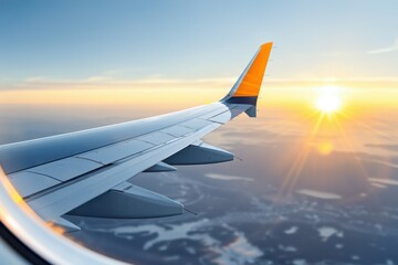 Obraz premium Airplane Wing and Sunset View