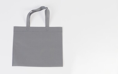 Spunbond bag in gray color isolated on white background.