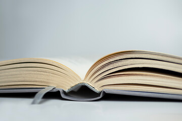 open book close up with bookmark