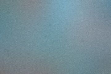Abstract textured pattern created by a blue grainy gradient background