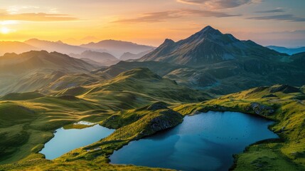 A tranquil mountain range with gently sloping hills and clear blue lakes, under a golden sunset.