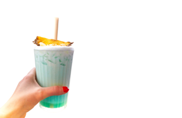 Womans hand with red nails holding a glass with a swimming pool cockatail on the white background with copy space