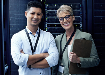 Computer center, mature woman and data engineer with clipboard, collaboration and programming....