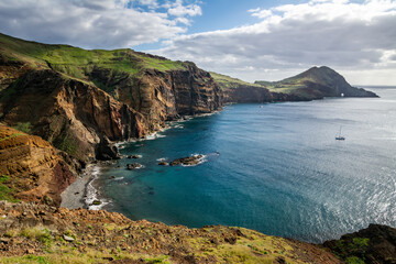 Beautiful scenic view of the peninsula of Ponta de Sao Lourenco with cliffs, Atlantic Ocean and blue sky. Artistic picture. Beauty world.